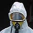 Asbestos Removal specialist in protective suit